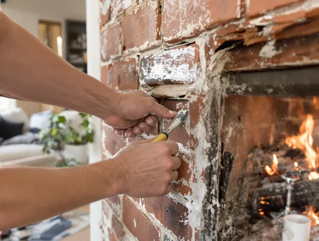 Routine fireplace repair by Matthews Chimney Sweep in Matthews, NC